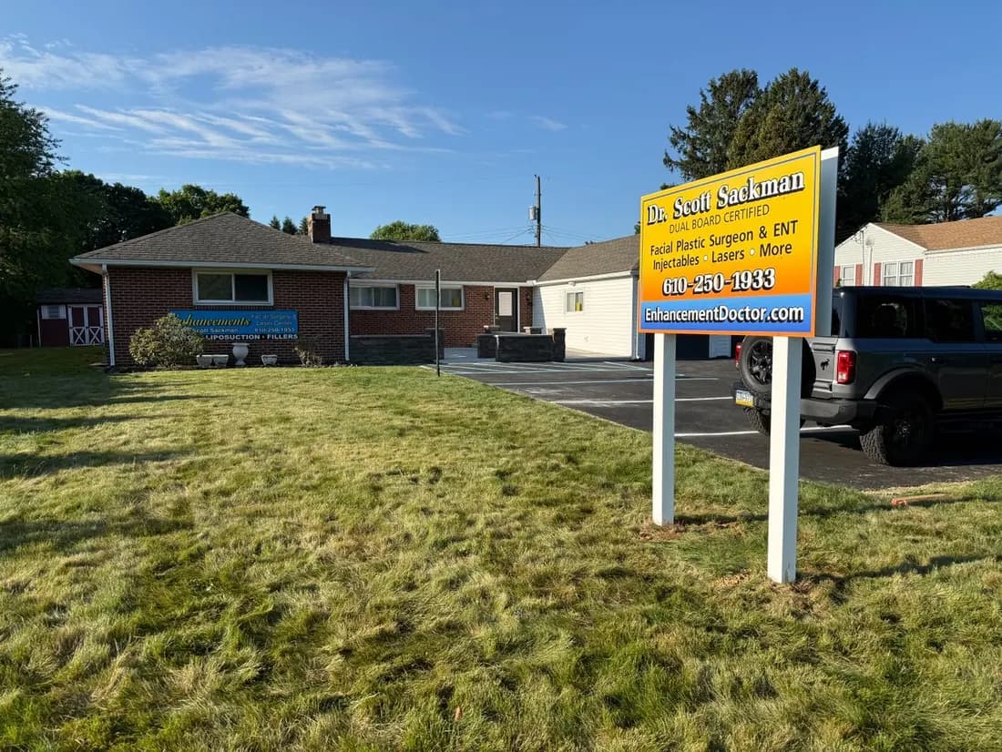 Enhancements Facial Plastic Surgery building and Dr. Scott Sackman sign at 4444 William Penn Highway, Bethlehem Township, PA